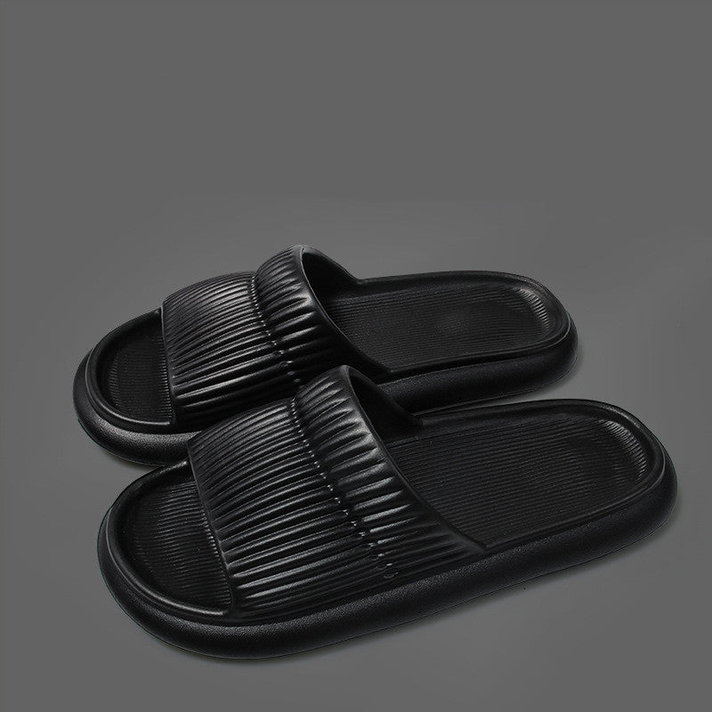 Black Arctic Nut Shower Slides with a striped EVA design.