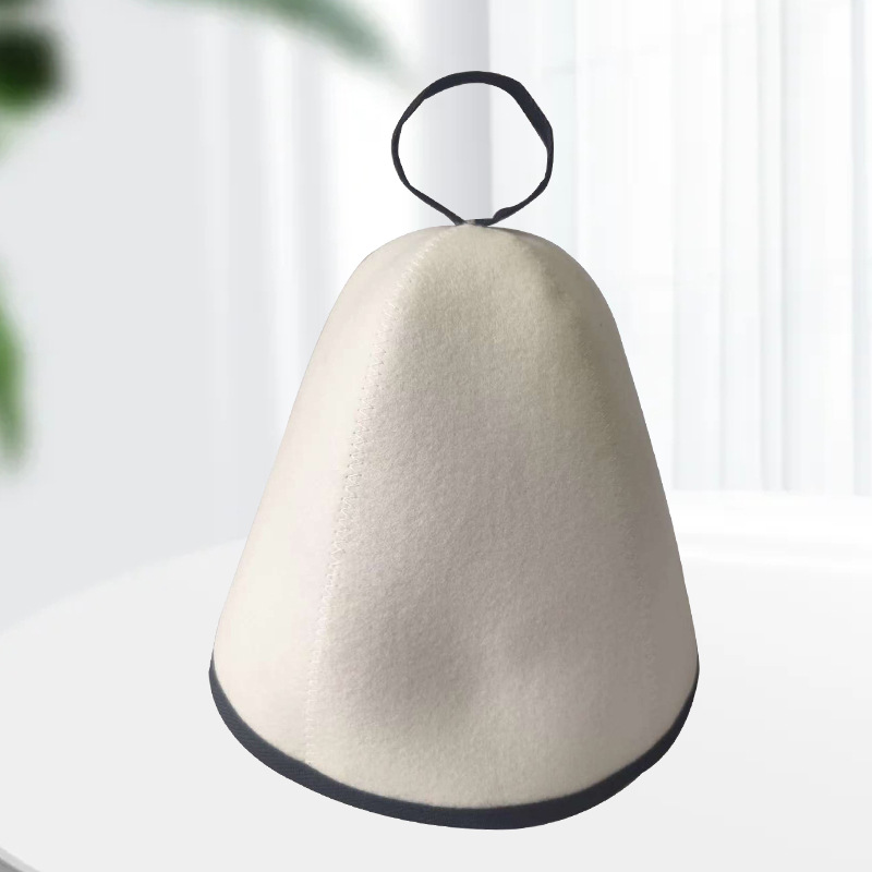 Supplier photo of the white felt Arctic Nut Banya Hat with black trim on a plain background