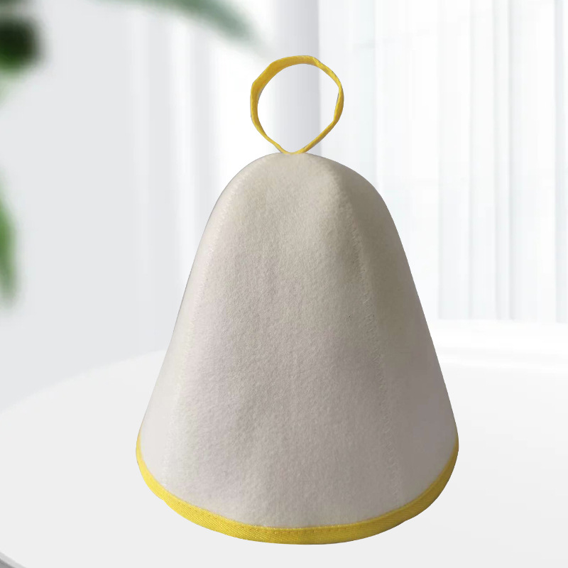 Supplier photo of the white felt Arctic Nut Banya Hat with yellow trim on a plain background
