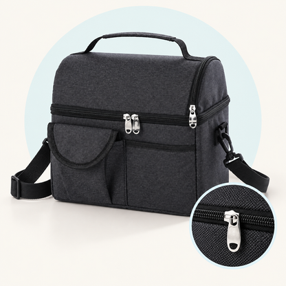 Product study of the black Insulated Carry Bag with two zipped levels, front pockets, handle and shoulder strap, with magnified zipper detail