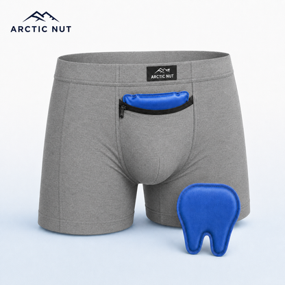 Arctic Nut Cooling Brief in Grey with one blue contoured gel pack in the zippered cooling pocket and a second reusable pack beside it.